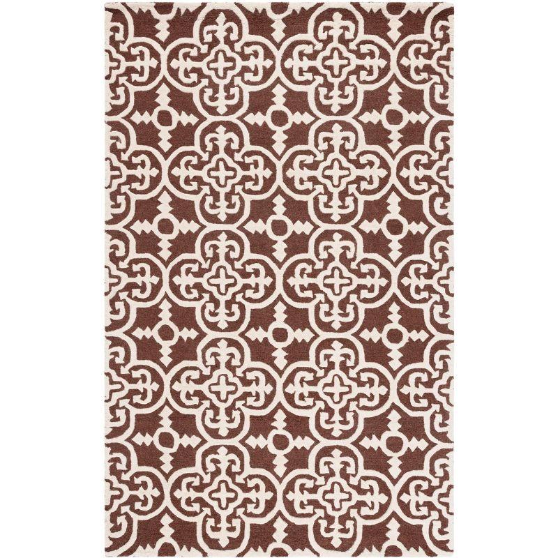 Cambridge CAM133 Hand Tufted Area Rug  - Safavieh