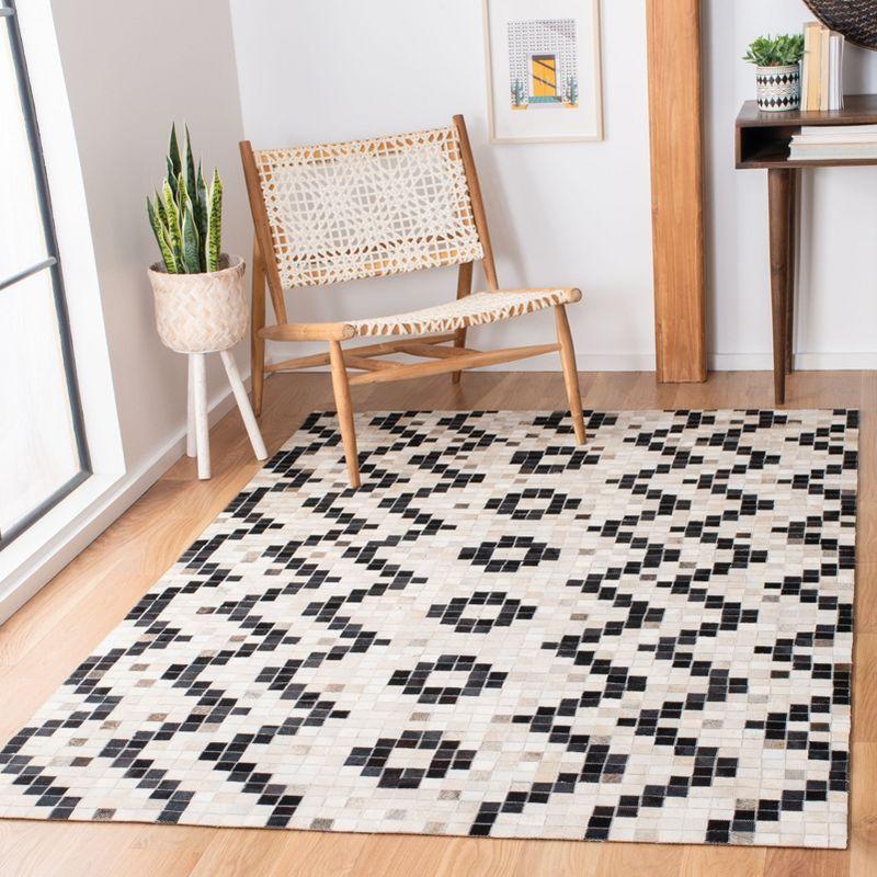 Handmade Black and White Geometric Cowhide Rug