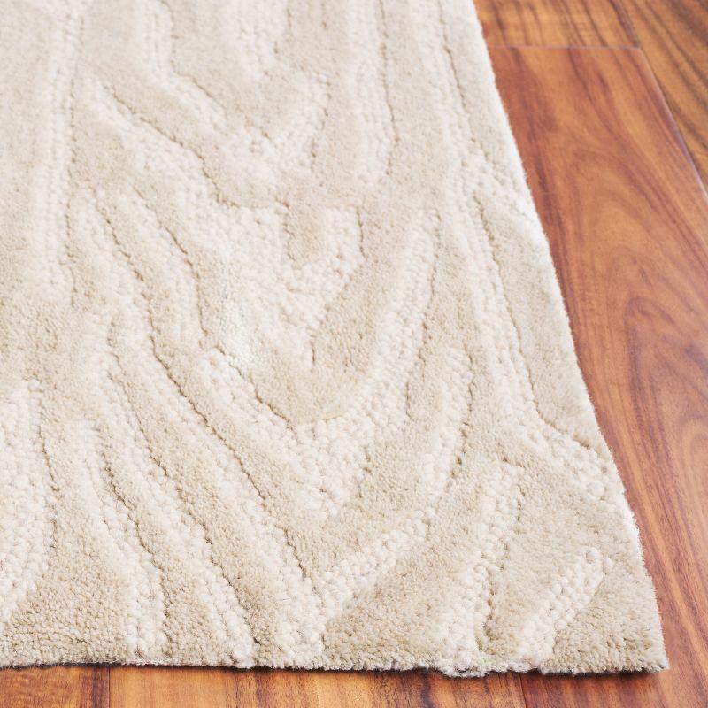 Ebony EBN550 Handmade Tufted Area Rug - Ivory - 6' X 9' - Safavieh