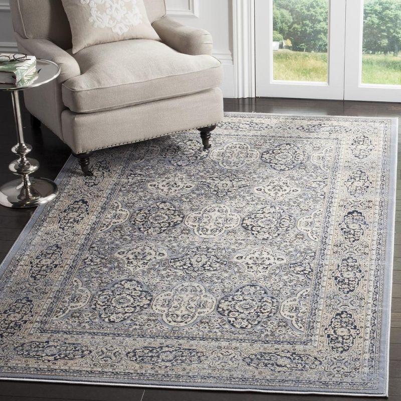 Handmade Light Blue and Ivory Round Viscose Area Rug