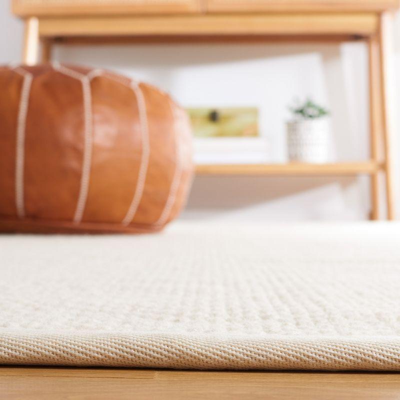 Handwoven Ivory Wool 8' x 10' Rectangular Area Rug