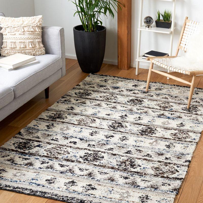 Manhattan Luxe Black and Ivory Hand-Knotted Wool Shag Rug - 4' x 6'