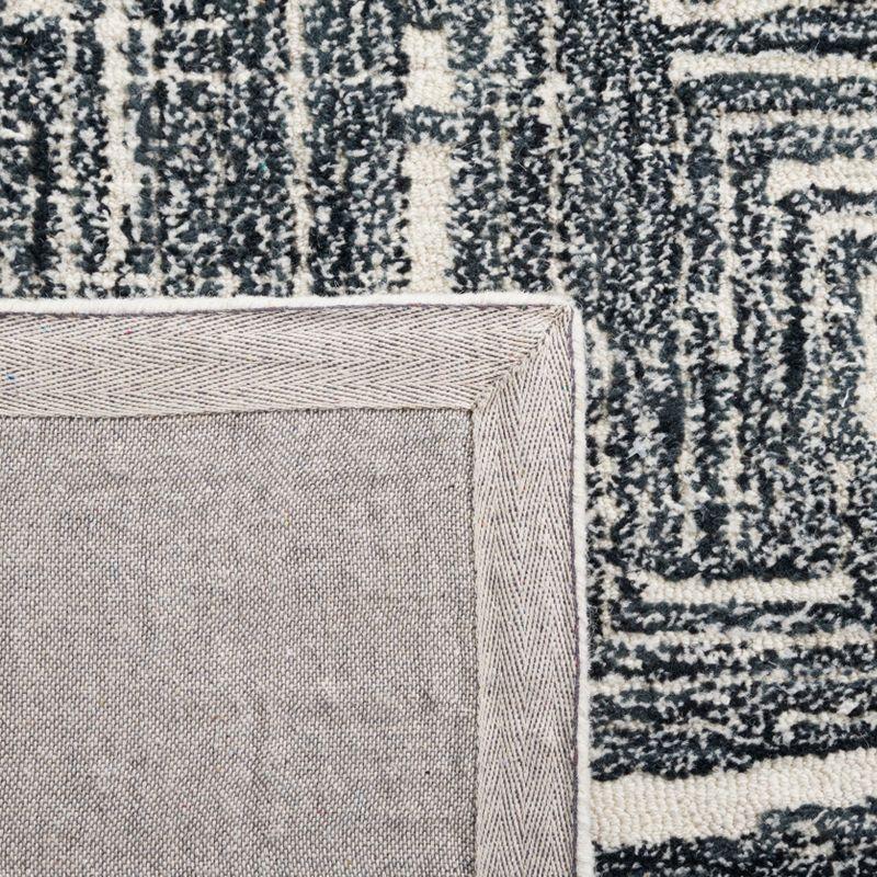 Metro MET177 Hand Tufted Indoor Area Rug - Black/Ivory - 4'x6' - Safavieh