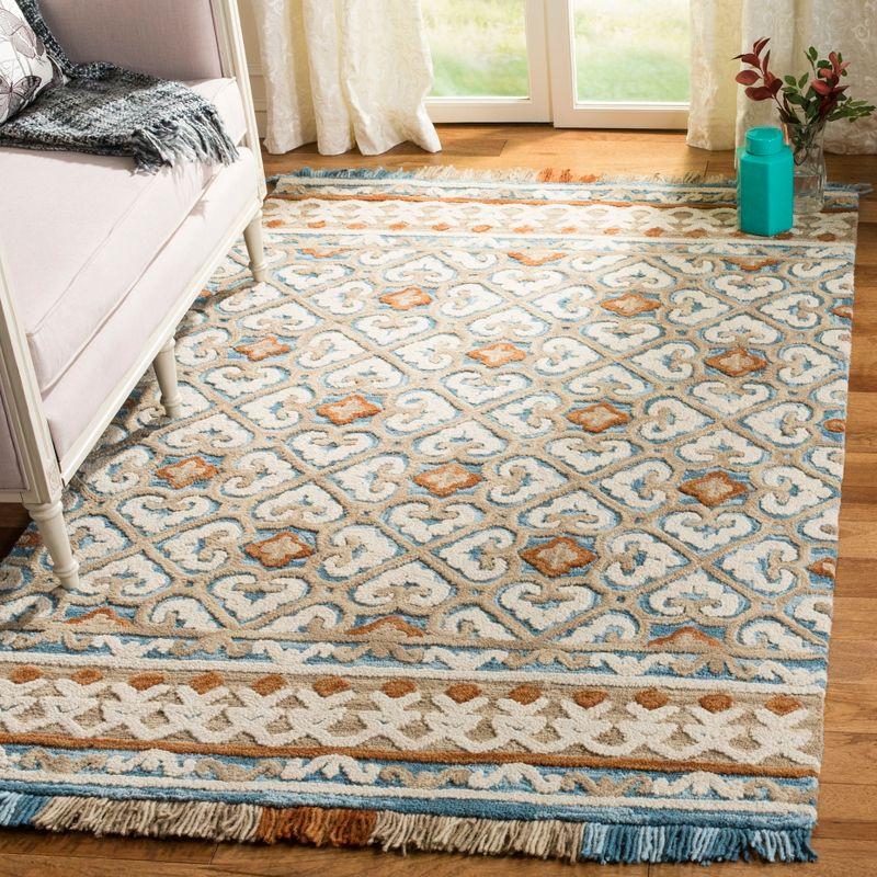 Blossom BLM420 Hand Tufted Area Rug - Ivory/Blue - 8'x10' - Safavieh.