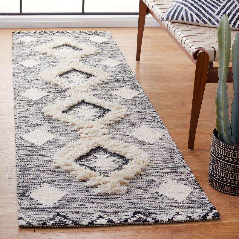 Hand-Knotted Elegance Black and Ivory Wool Runner Rug - 27" x 8"