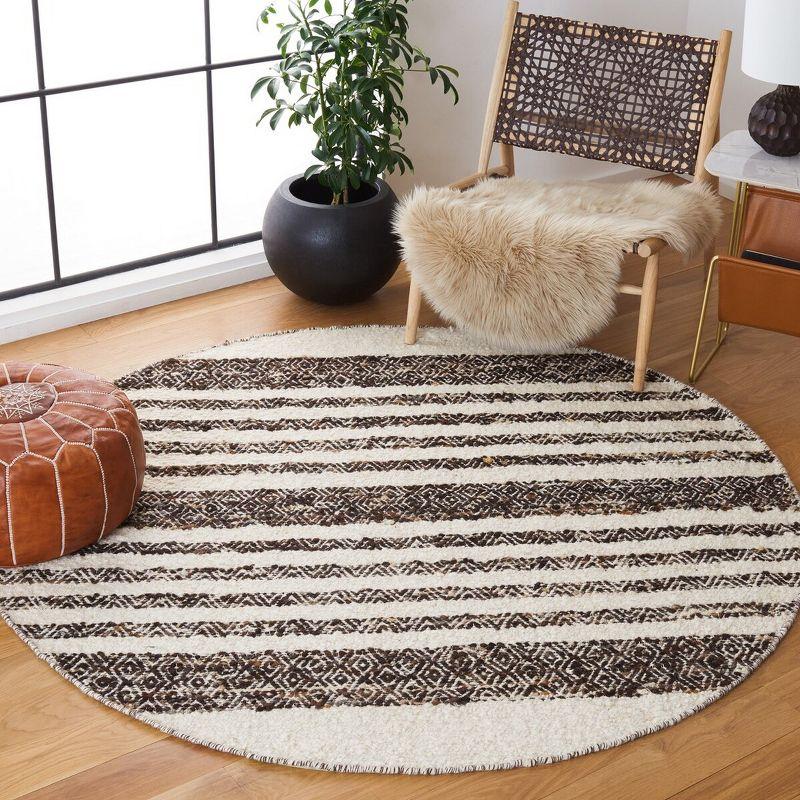 Black and Ivory Round Handwoven Wool Cotton Area Rug