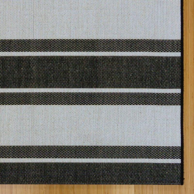 Coastal Charm Black and White Stripe 9' x 12' Synthetic Area Rug