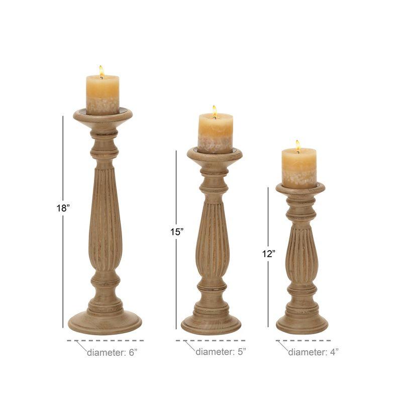 Olivia & May Set of 3 Farmhouse Mango Wood Teardrop Designed Pillar Candle Holders: Rustic Wooden Candlestick Holders