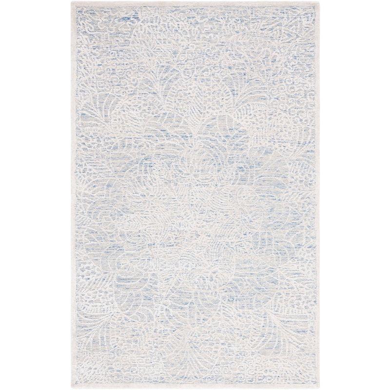 Blue and Ivory Tufted Wool Geometric Area Rug 5' x 8'