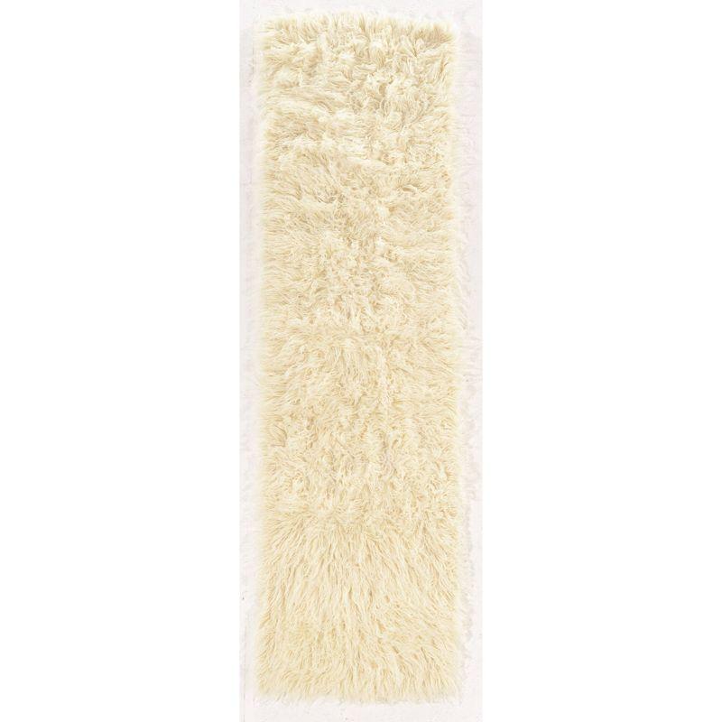 Ebern Designs Aaiden Flokati Wool Shag Hand Loomed Ivory Rug