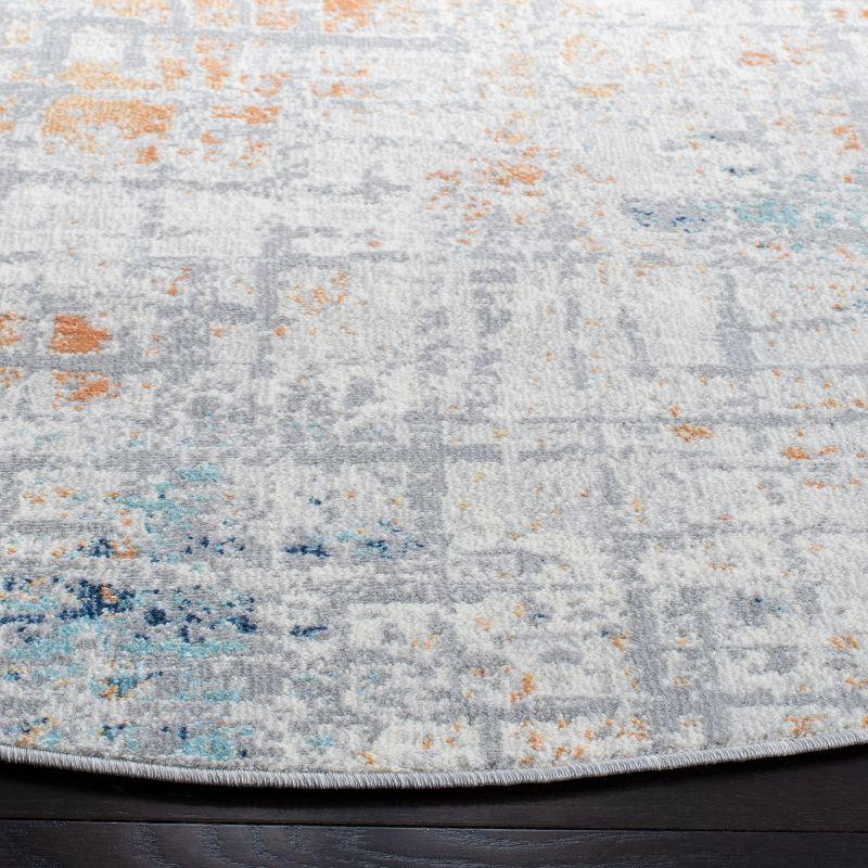 Aria Round Blue and Orange Synthetic Area Rug