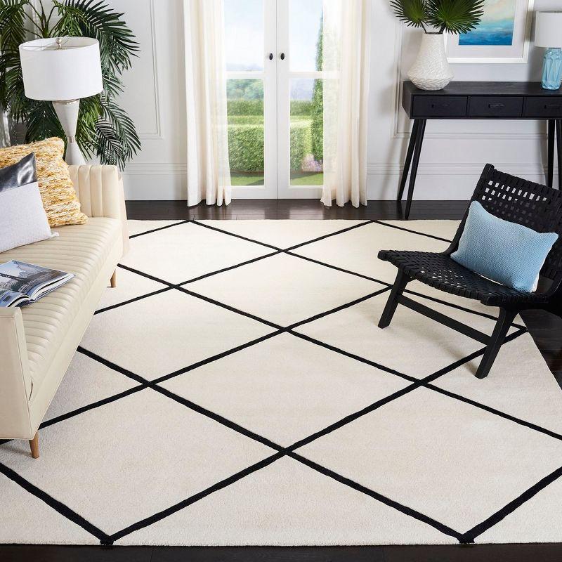 Elegant Ivory & Black Hand-tufted Wool Area Rug - 8' x 10'