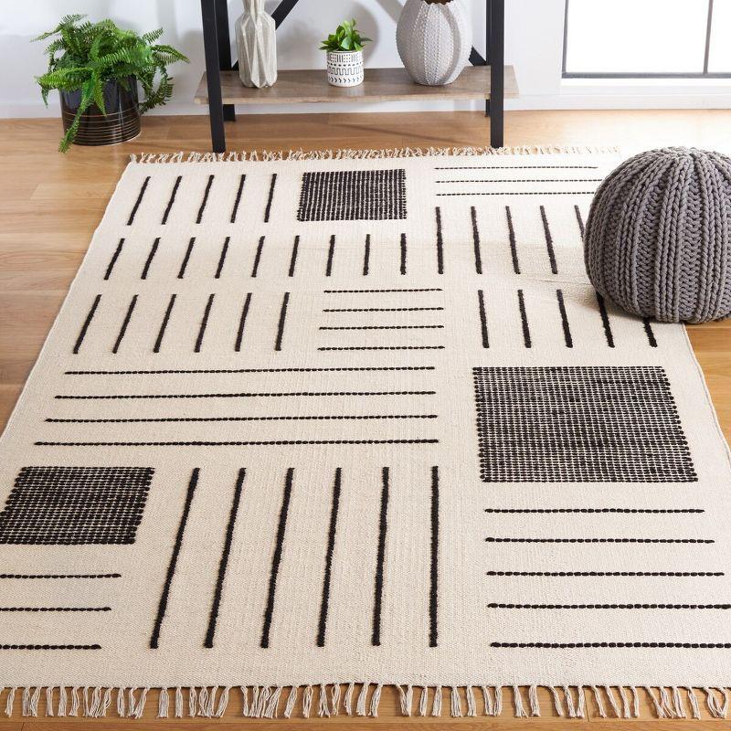 Black and Ivory 4' x 6' Hand Woven Wool Cotton Area Rug