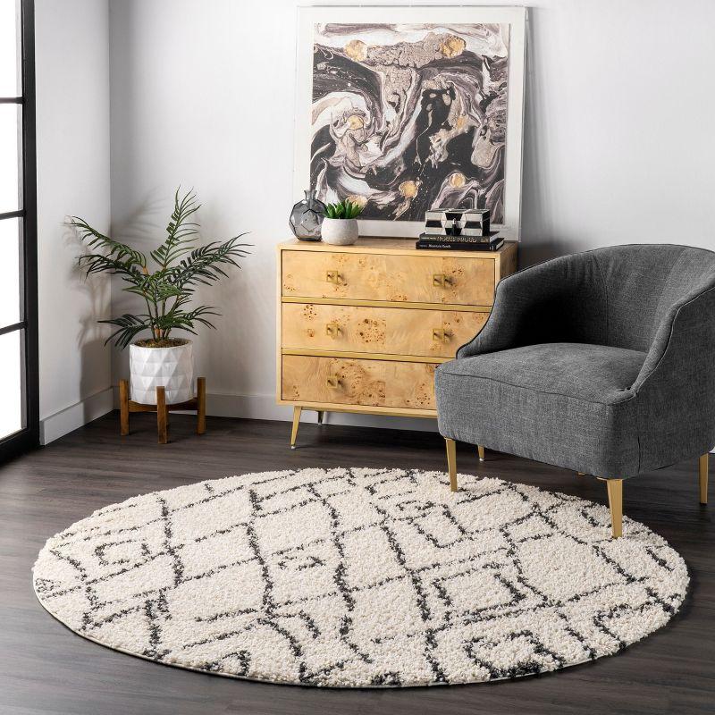 Ivory Oval Shag Reversible Synthetic Area Rug, 5' x 8'