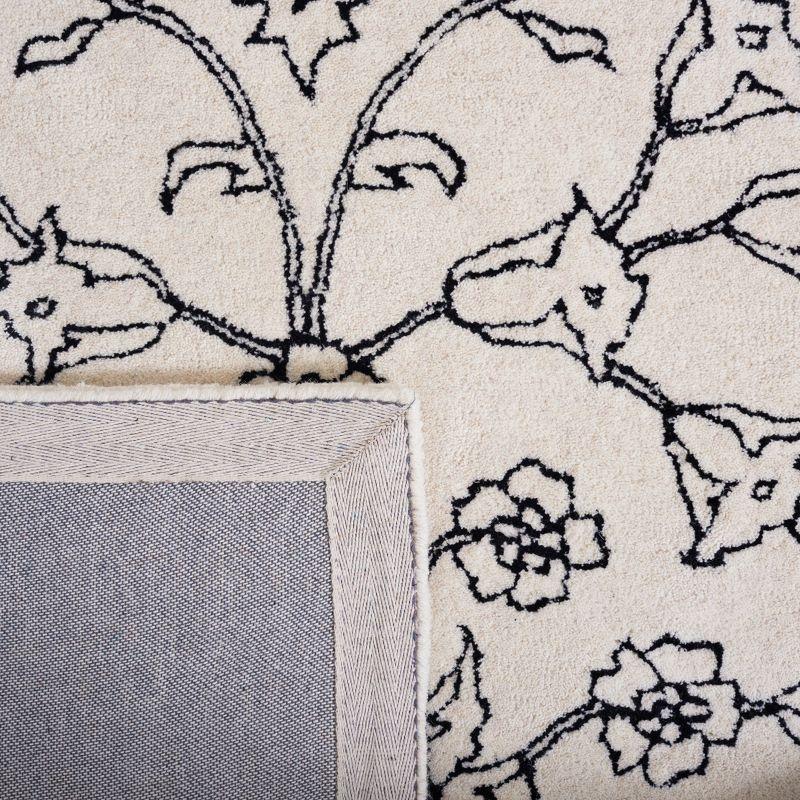 Jardin JAR730 Hand Tufted Area Rug - Ivory/Black - 4'x6' - Safavieh.