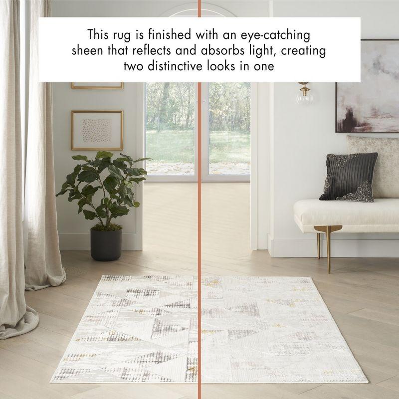 Ivory Abstract Shimmer 5' x 7' Synthetic Area Rug