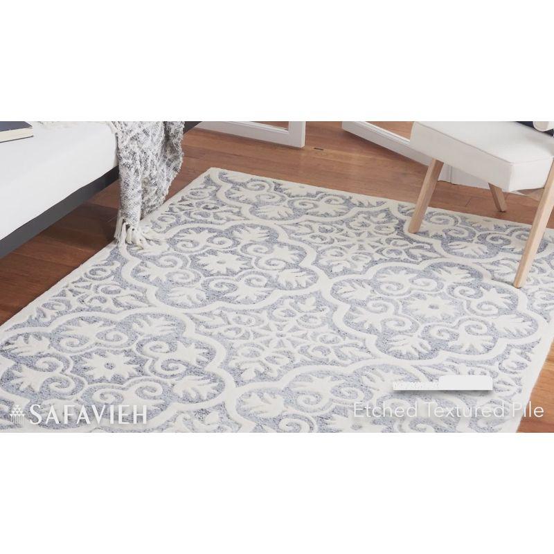 Elegant Floral Light Blue Hand-Tufted Wool Area Rug 4' x 6'