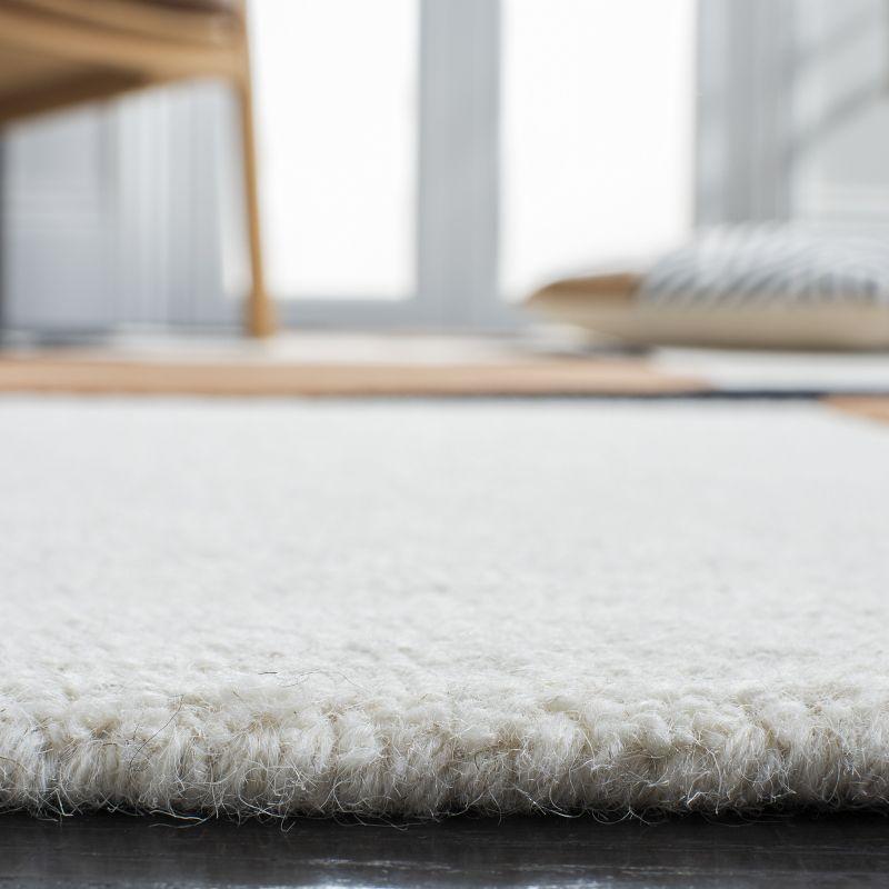 Rodeo Drive RD856 Hand Tufted Indoor Accent Rug - 4'x6' - Ivory/Black - Safavieh
