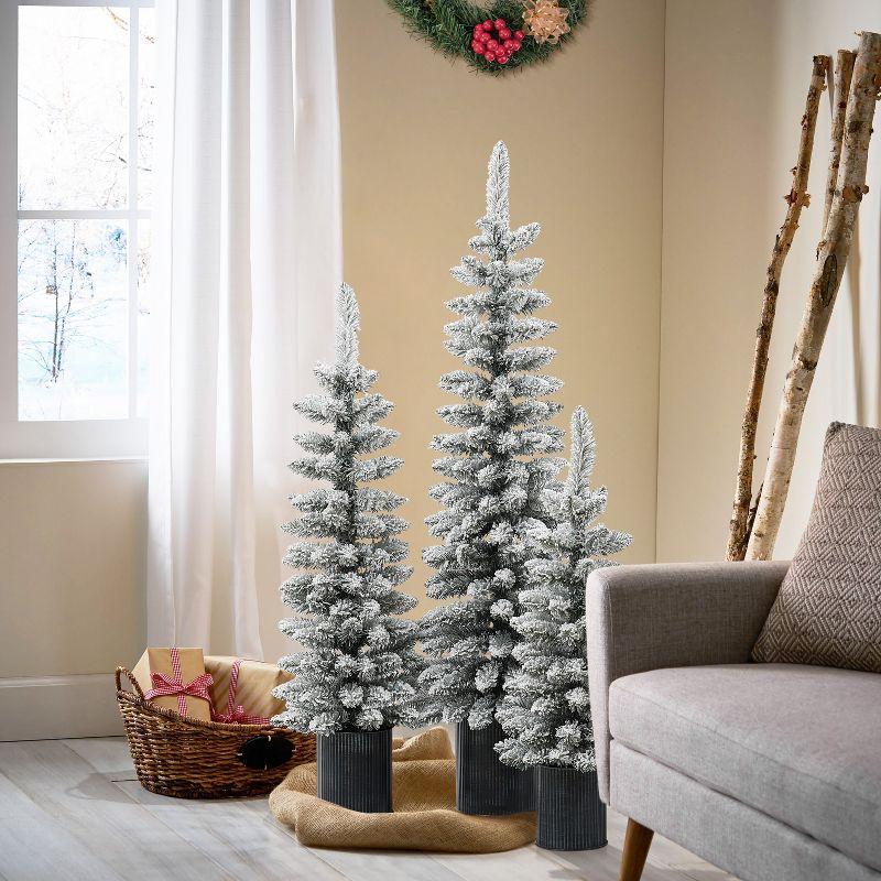 LuxenHome Set of 3 Unlit Snow-Flocked Christmas Trees with Metal Pots White