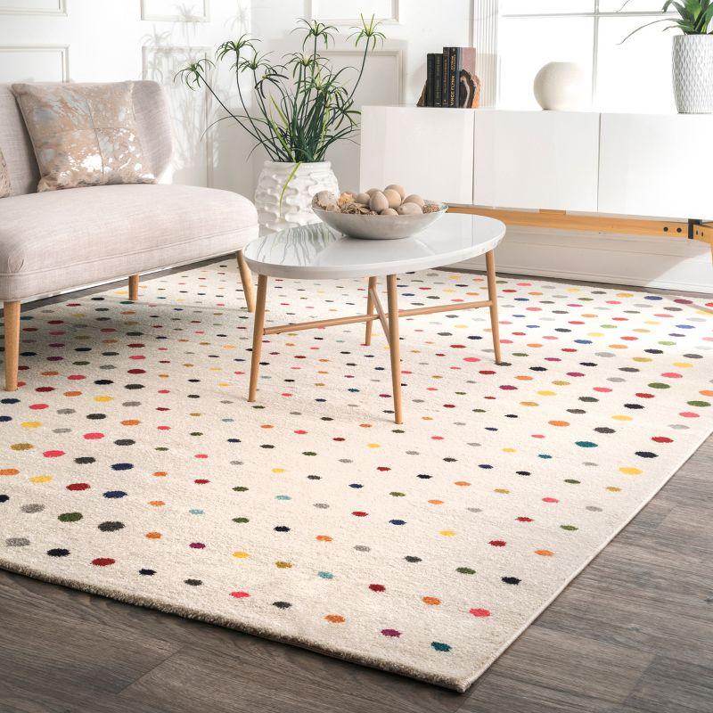 Dorie Multicolor Polka Dot 6'7" x 9' Synthetic Area Rug