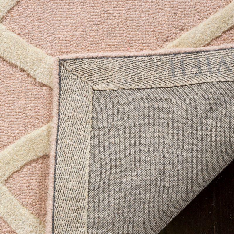 Safavieh Kids Abstract SFK905 Hand Tufted Indoor Area Rug - Pink/Ivory - 5'x5' - Safavieh