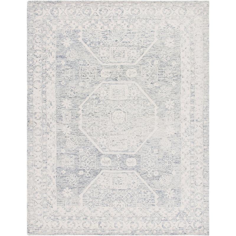 Elegant Ivory 9' x 12' Hand-Tufted Wool Area Rug