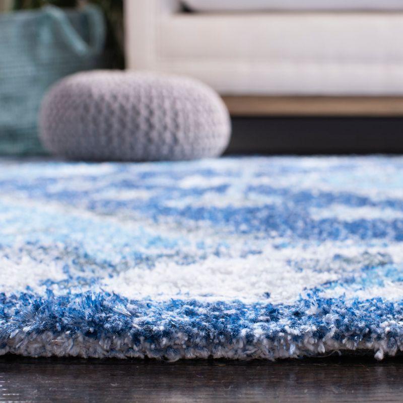 Saffron SFN549 Hand Loomed Area Rug - Blue/Ivory - 5'x8' - Safavieh.