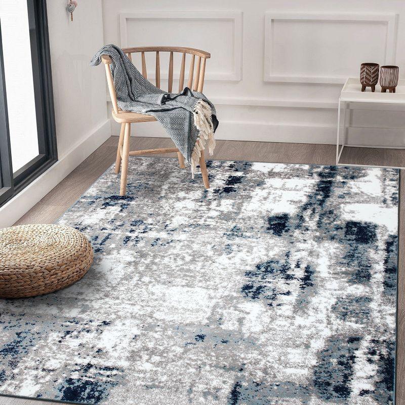 Reversible Blue Abstract Synthetic 5' x 7' Easy-Care Area Rug