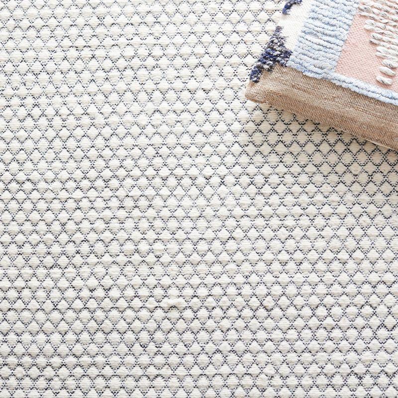 Montauk MTK813 Hand Woven Area Rug - Ivory/Black - 5'x8' - Safavieh.