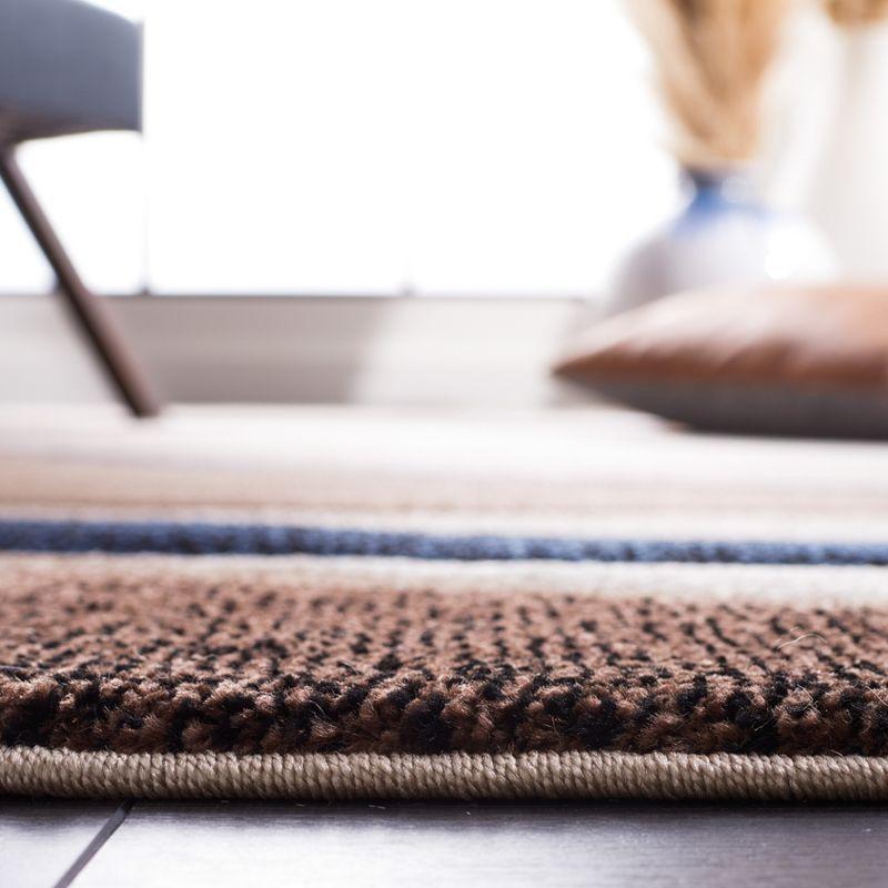 Hollywood HLW766 Machine Made Area Rug - 6'7"x9' - Beige/Blue - Safavieh