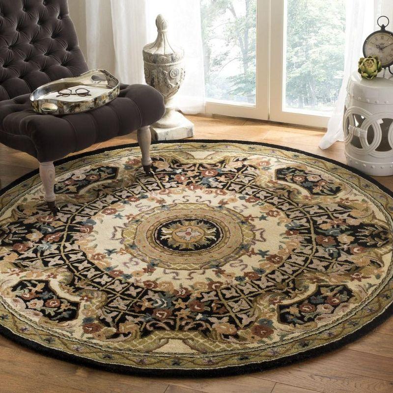 Classic CL304 Hand Tufted Area Rug - Black/Gold - 3'6" round - Safavieh.