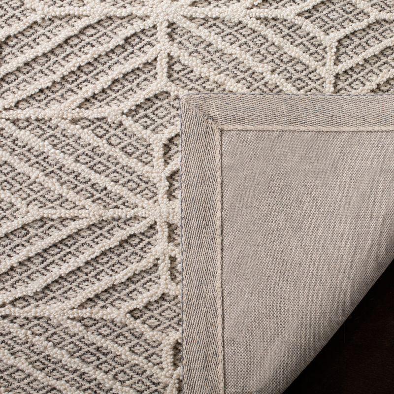 Ivory and Black Geometric Hand-Tufted Wool Area Rug