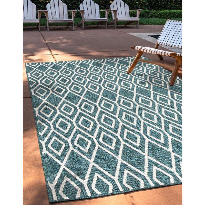 Teal and Ivory Geometric Outdoor Rectangular Area Rug 5' x 7'