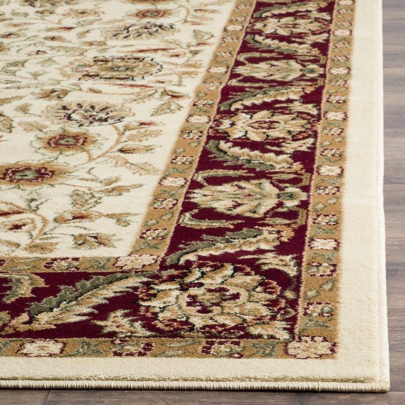 Ivory and Red Floral Synthetic 6' x 9' Area Rug