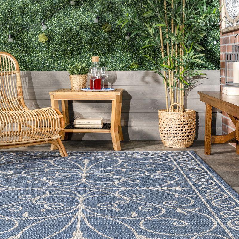 Charming Blue 5' x 7' Rectangular Synthetic Indoor/Outdoor Rug