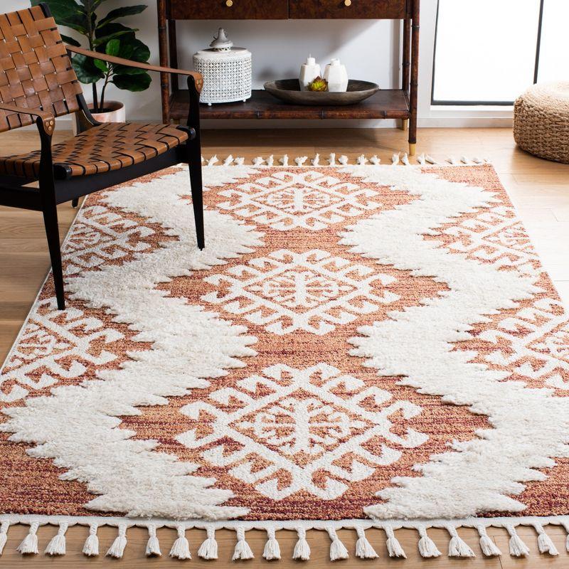 Moroccan Tassel Shag MTS652 Power Loomed Indoor Area Rug - Orange/Ivory - 5'3"x7'6" - Safavieh