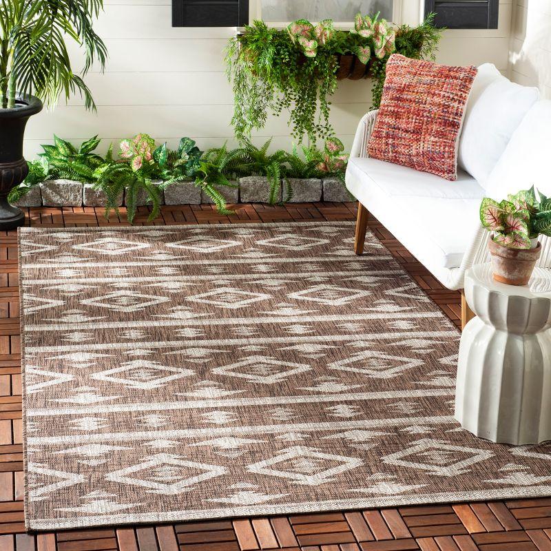 Brown and Ivory Rectangular Flat Woven Synthetic Area Rug