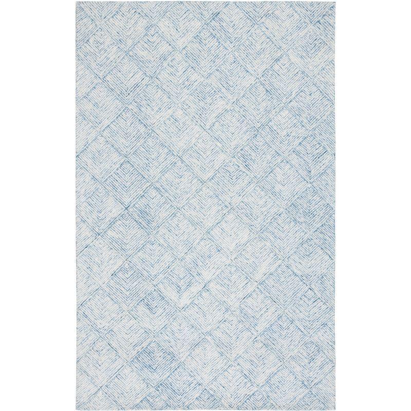 Blue and Ivory 6' x 9' Wool Abstract Tufted Rug