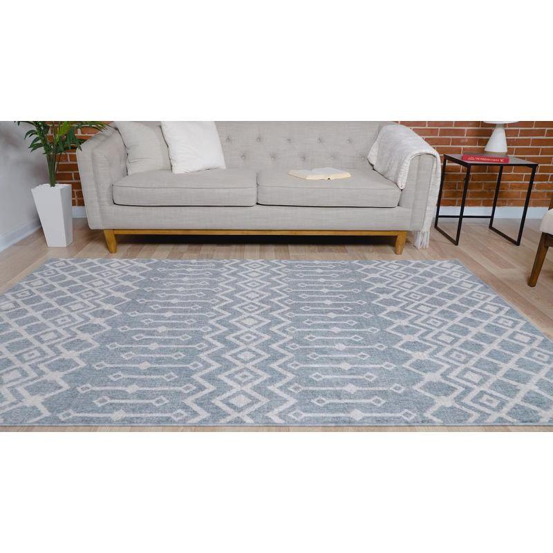 Eco-Friendly Ivory Geometric 4' x 6' Synthetic Area Rug