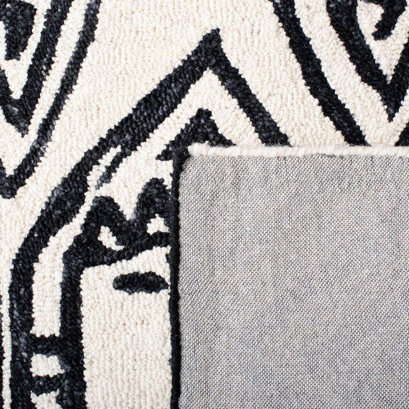 Metro MET404 Hand Tufted Area Rug - Black/Ivory - 3'x5' - Safavieh.