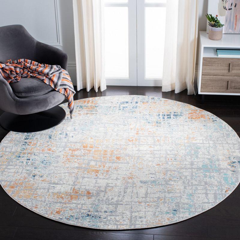 Aria Round Blue and Orange Synthetic Area Rug