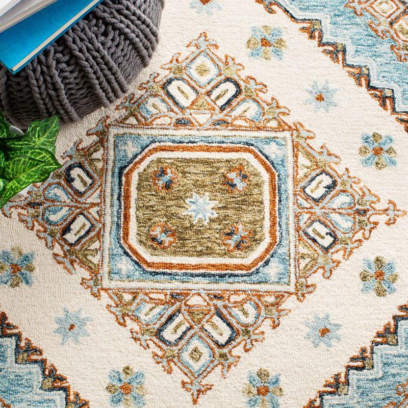 Capri CPR209 Hand Tufted Area Rug - Ivory/Rust - 7'x7' - Safavieh.