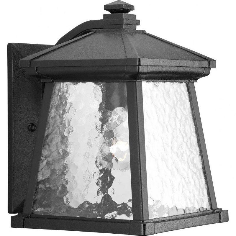 Black Cast Aluminum Lantern Sconce with Water Patterned Glass Shade