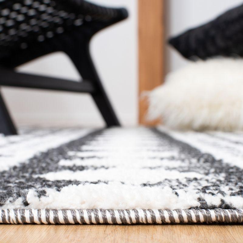 Ivory and Black Braided Diamond Shag Rectangular Rug