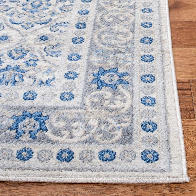 Ivory and Blue Hand-knotted Rectangular Synthetic Rug