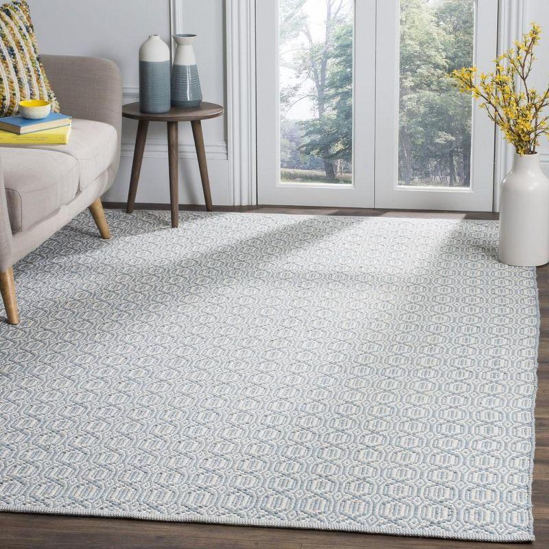 Ivory and Blue Handwoven Wool Cotton Area Rug, 6' x 9'