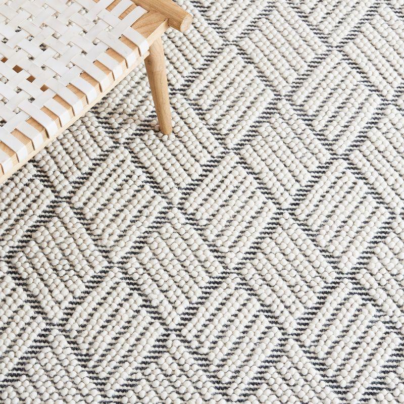 Handwoven Ivory and Black Wool 4' x 6' Area Rug