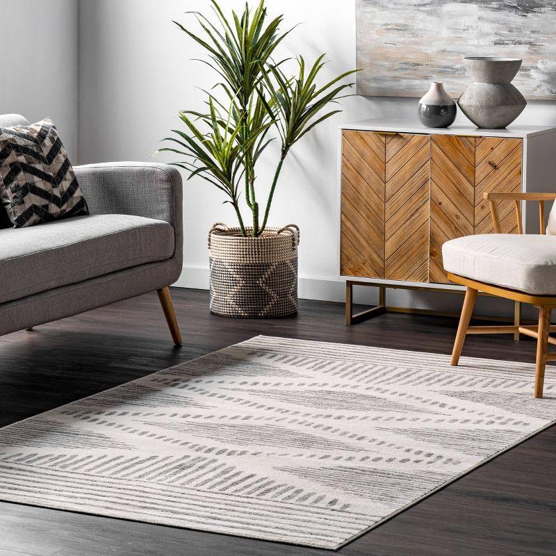 Elysian 4' x 6' Reversible Light Gray Synthetic Area Rug