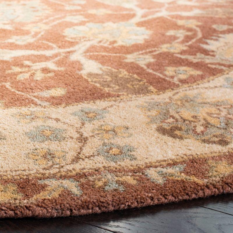 Antiquity AT315 Hand Tufted Area Rug - Brown/Taupe - 8' round - Safavieh.