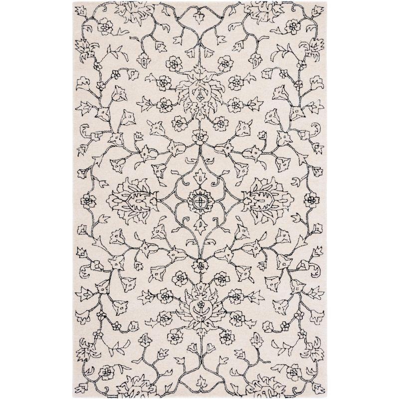 Ivory and Black Floral Hand-Tufted Wool Area Rug 4' x 6'